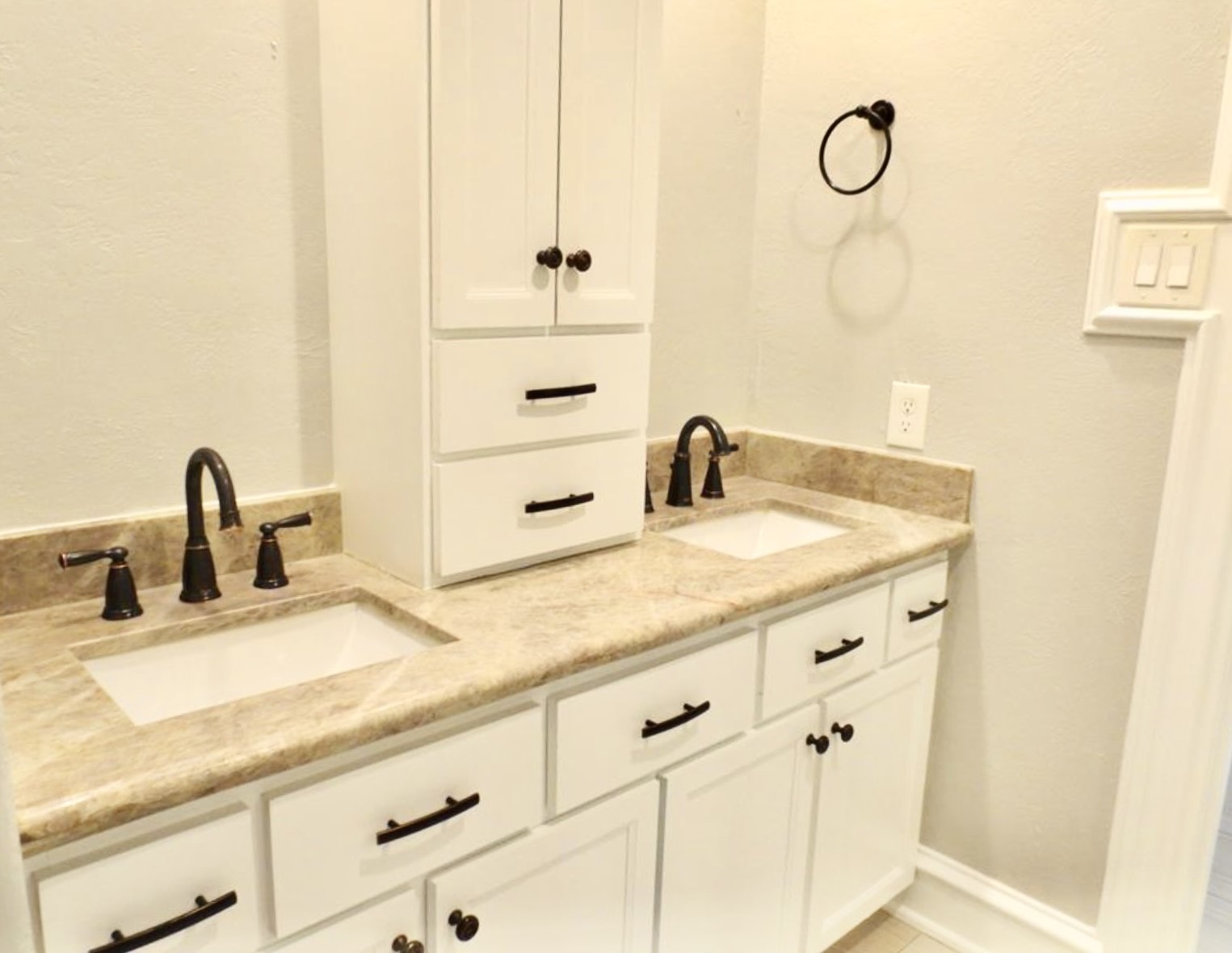 8214 Split Oak Drive Houston, TX 77040 - Photo 9 of 15 a bathroom with a sink and a mirror