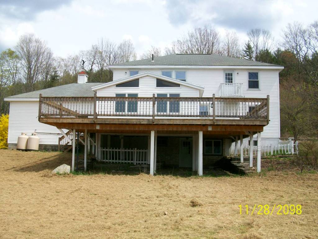 59 Swamp Road West Stockbridge, MA 01266 - Photo 11 of 11 a front view of a house with a large window