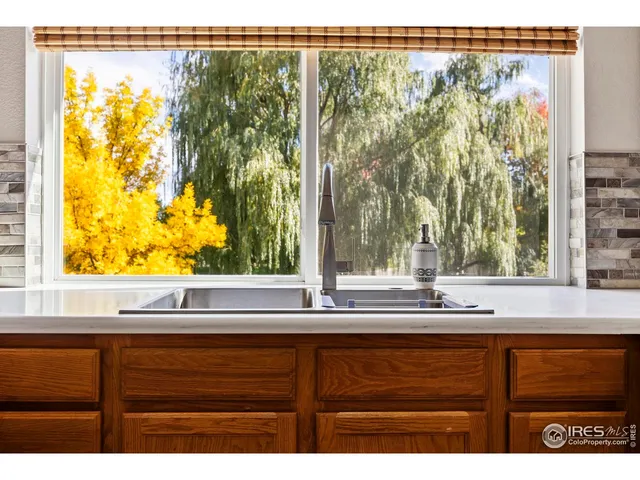 a sink window and a bed