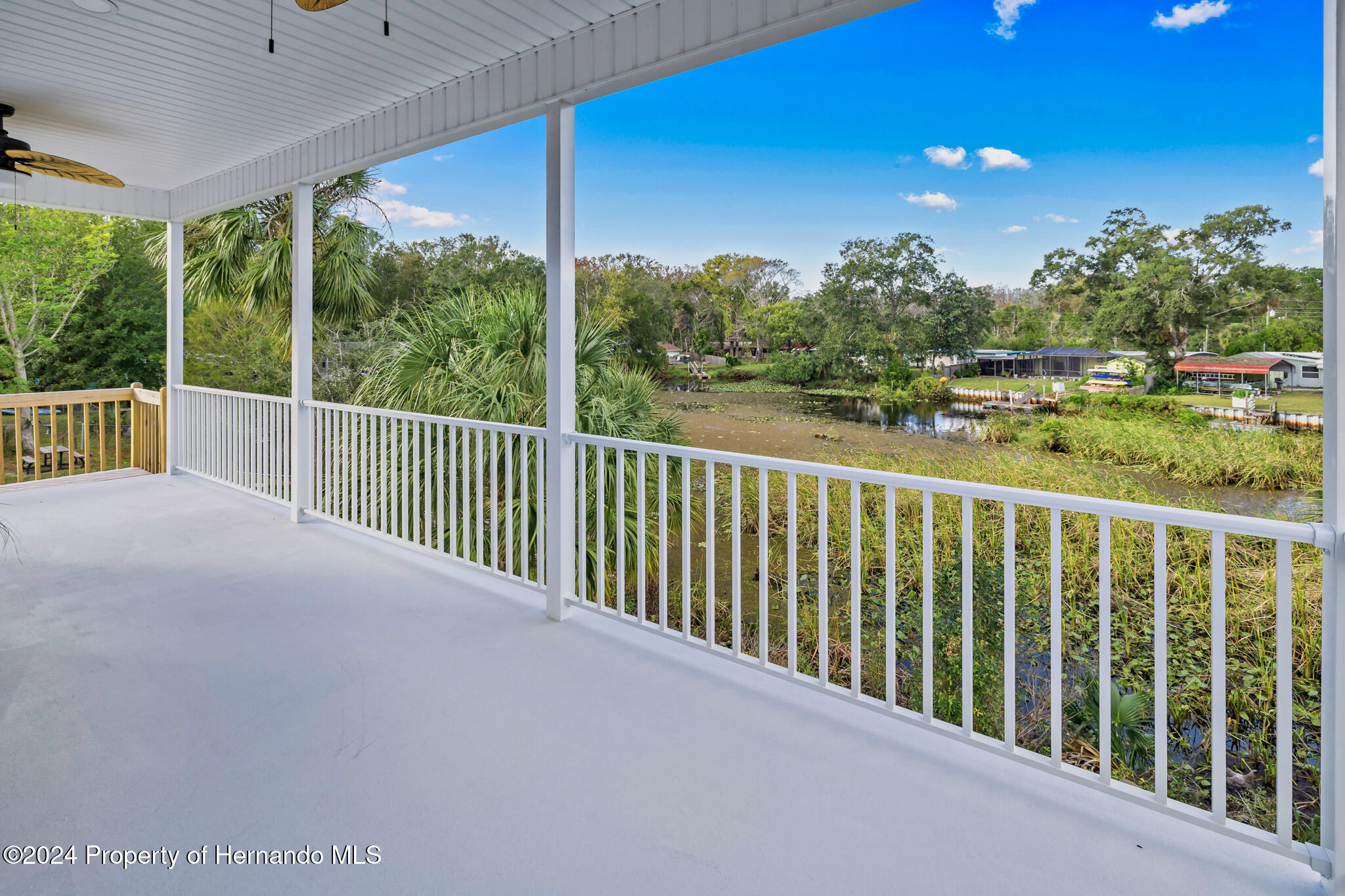 6435 Finance Avenue Weeki Wachee, FL 34607 - Photo 24 of 35 a balcony with an outdoor space