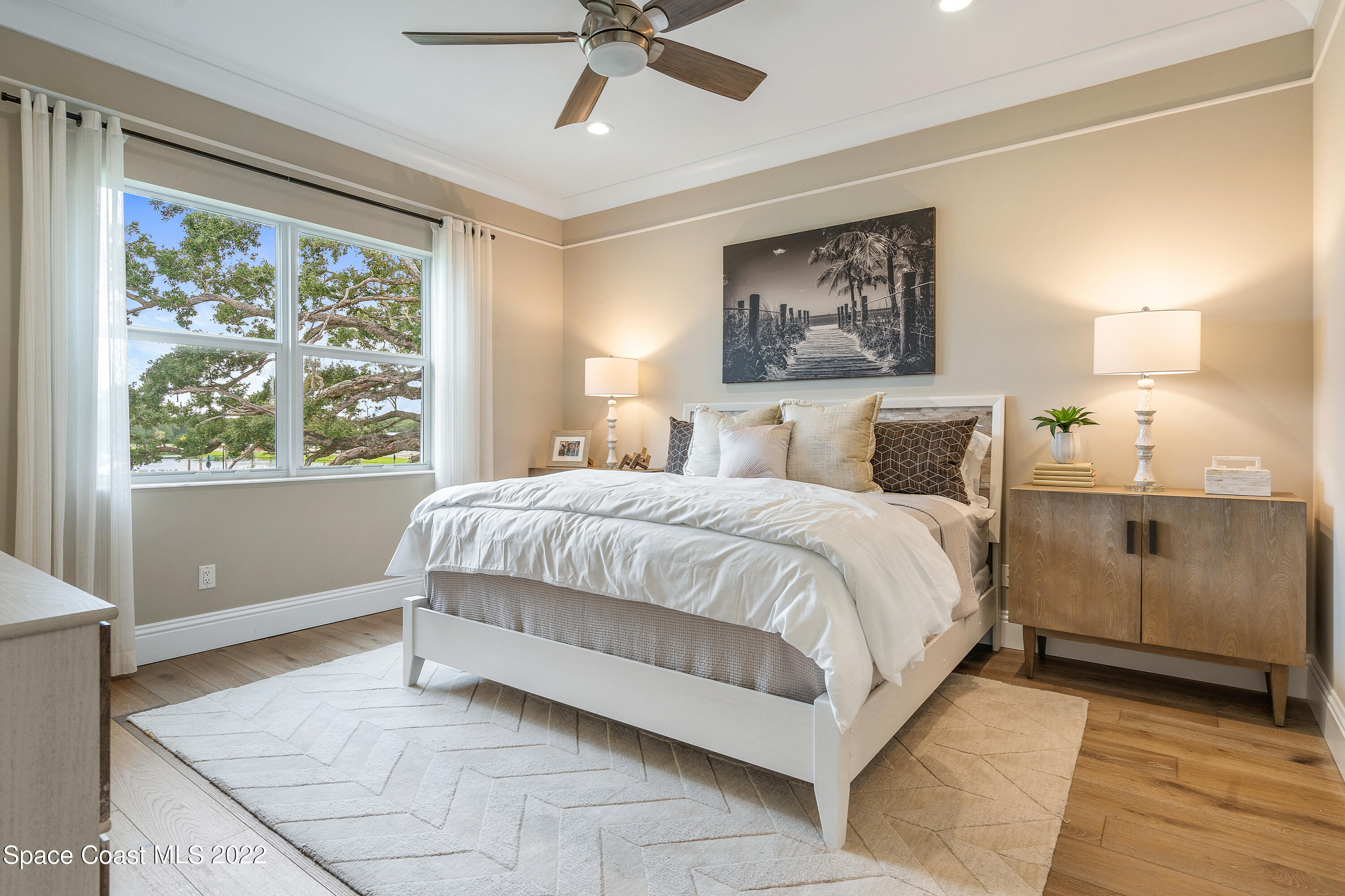 20 Strand Drive Vero Beach, FL 32963 - Photo 28 of 36 a bedroom with a large bed and a window