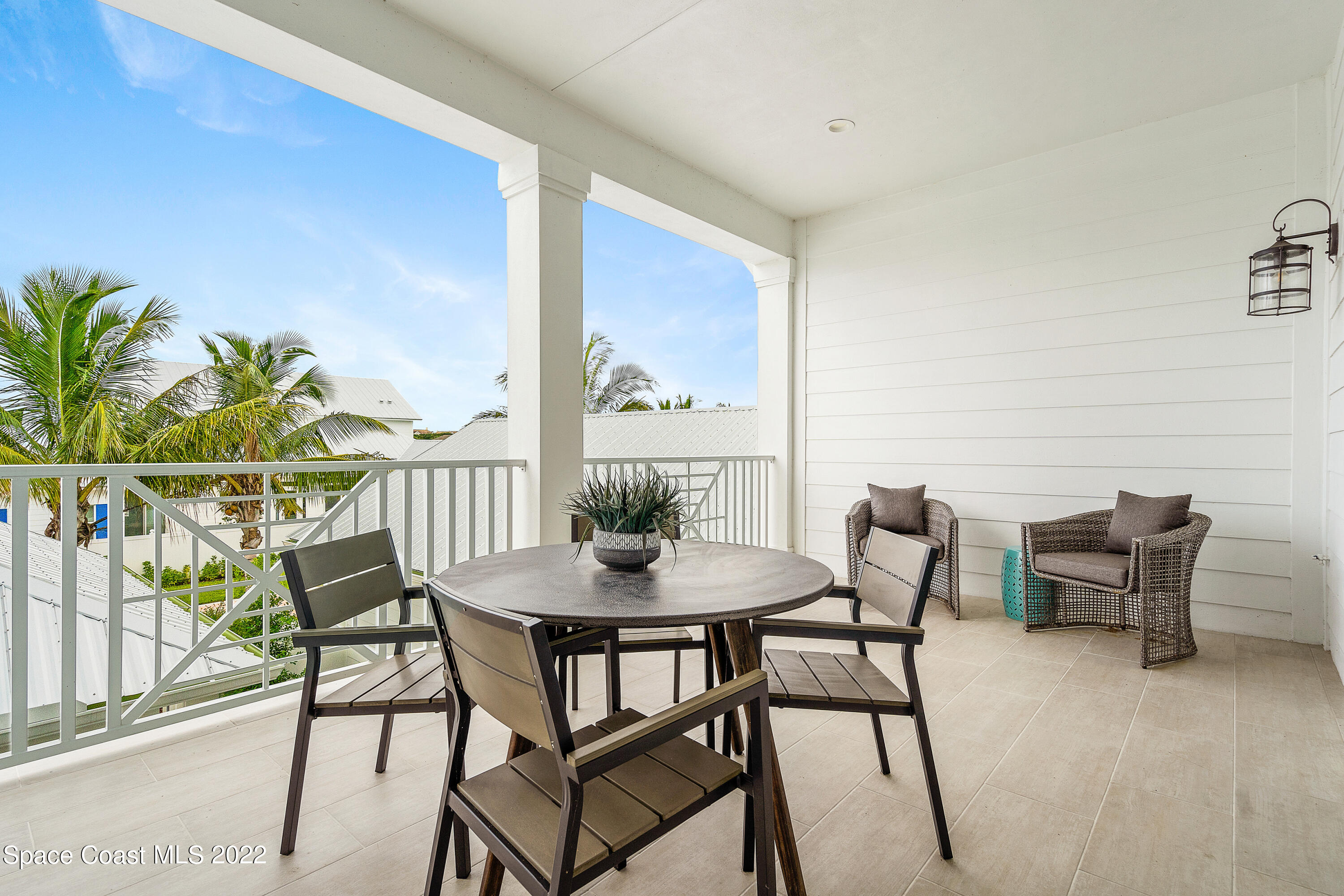 20 Strand Drive Vero Beach, FL 32963 - Photo 32 of 36 a view of a dining room with furniture and a potted plant