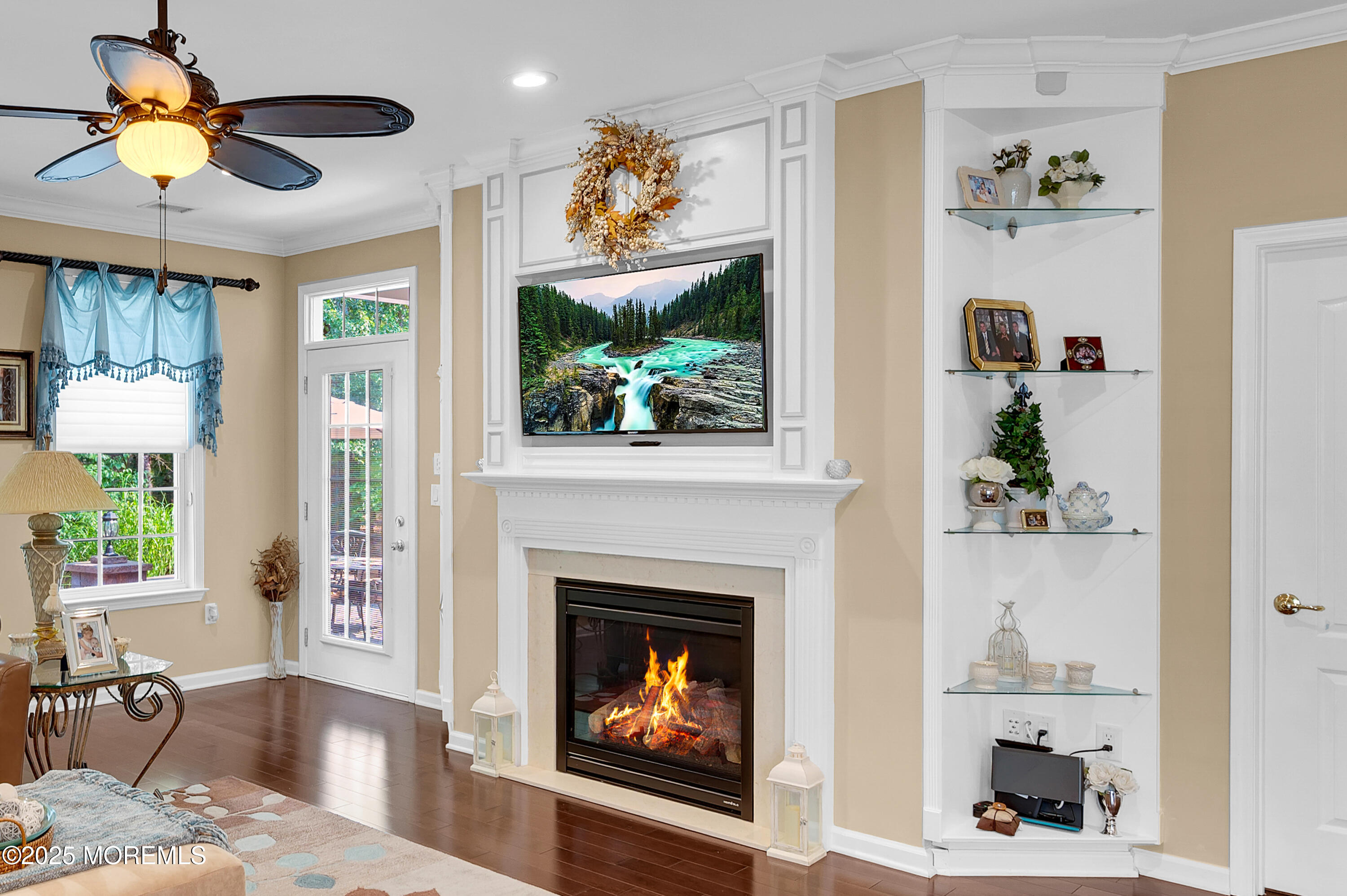 23 Lenox Road Jackson, NJ 08527 - Photo 15 of 35 a living room with furniture and a fireplace