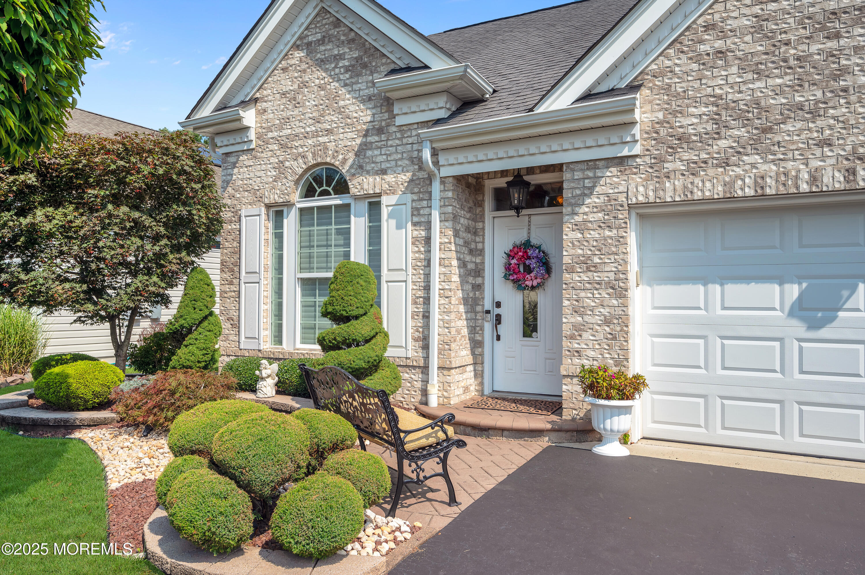 23 Lenox Road Jackson, NJ 08527 - Photo 2 of 35 a front view of a house with garden