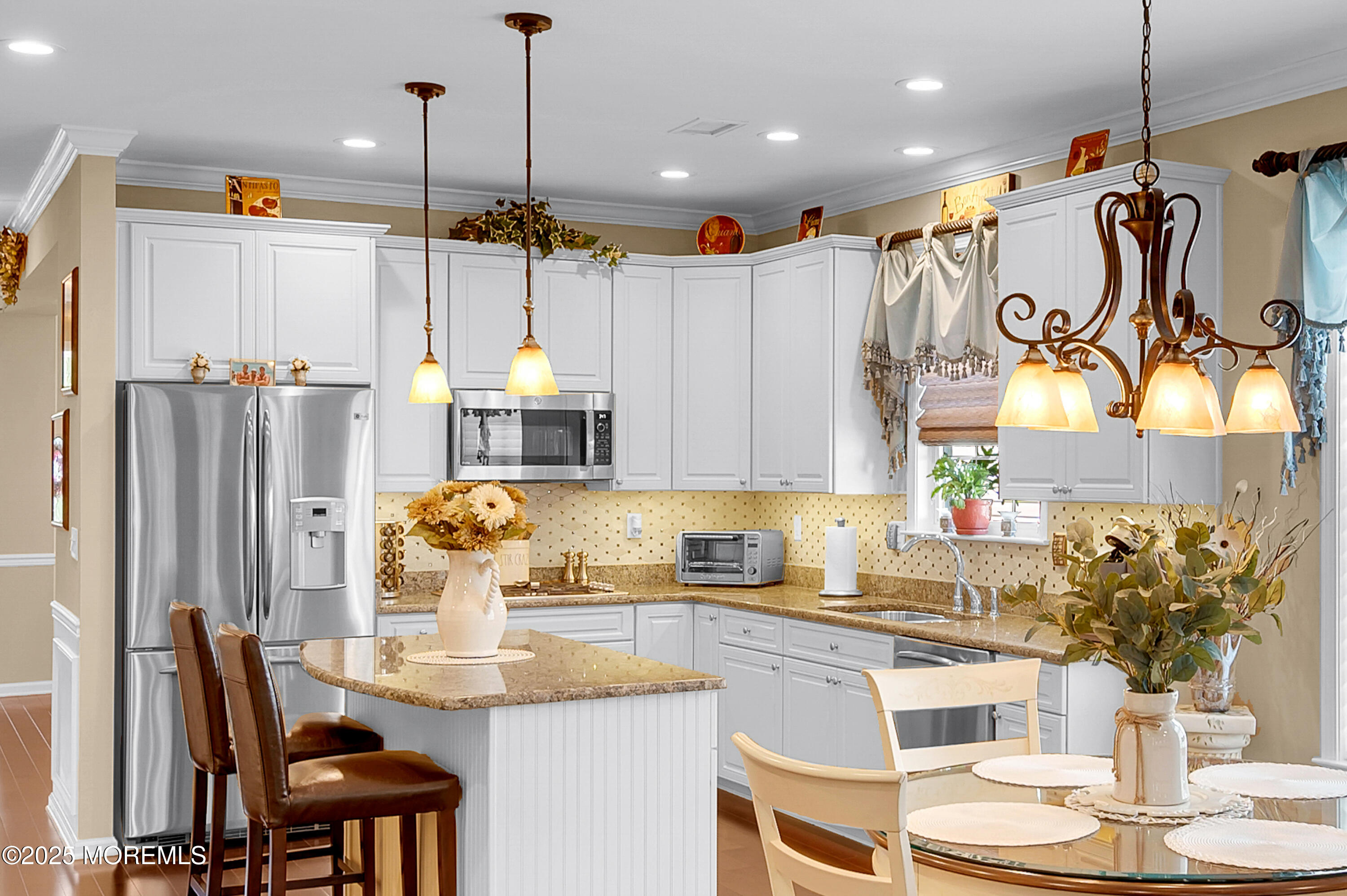 23 Lenox Road Jackson, NJ 08527 - Photo 6 of 35 a kitchen with stainless steel appliances granite countertop a sink and a refrigerator