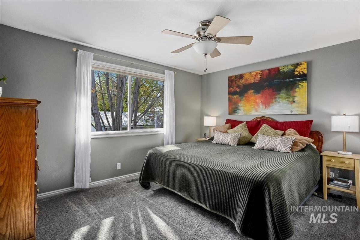 4870 North Farrow Street Boise, ID 83713 - Photo 12 of 40 Bedroom with carpet and a ceiling fan