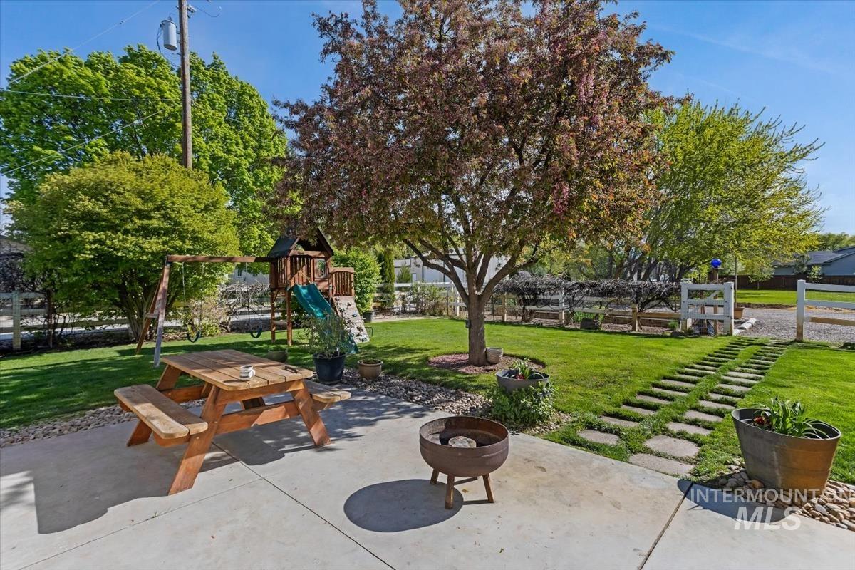 4870 North Farrow Street Boise, ID 83713 - Photo 25 of 40 View of patio / terrace with an outdoor fire pit