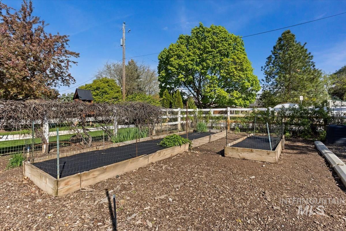 4870 North Farrow Street Boise, ID 83713 - Photo 30 of 40 View of community featuring a vegetable garden