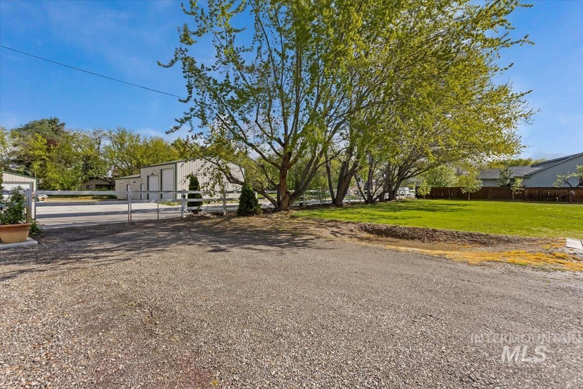 4870 North Farrow Street Boise, ID 83713 - Photo 34 of 40 View of road with a gated entry and a gate