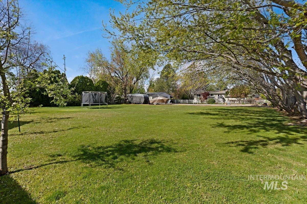 4870 North Farrow Street Boise, ID 83713 - Photo 35 of 40 View of yard featuring a trampoline