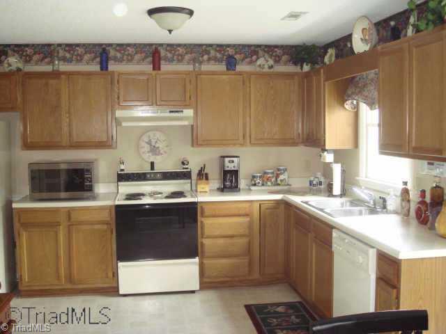 7698 Sedgewick Ridge Road Lewisville, NC 27023 - Photo 5 of 9 Other. Kitchen with tons of cabinets