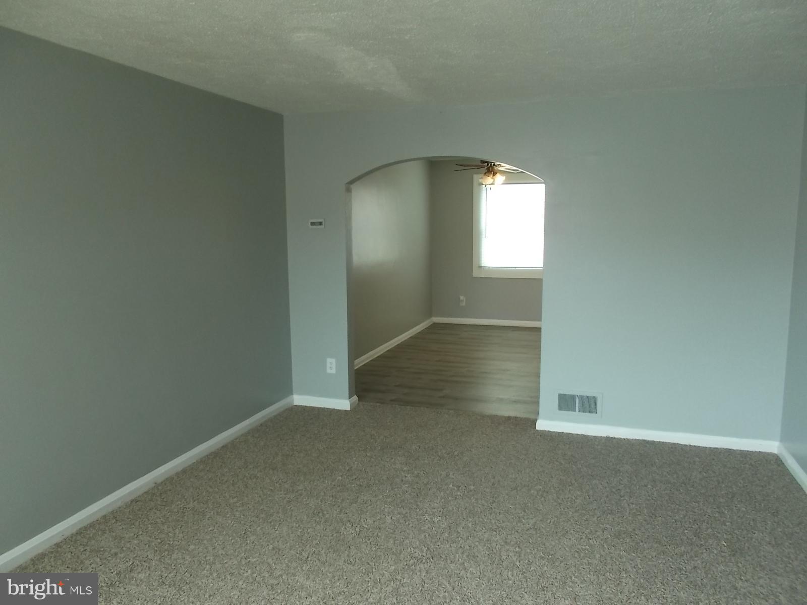 627 Aldworth Road Baltimore, MD 21222 - Photo 5 of 14 Living Room with new carpet