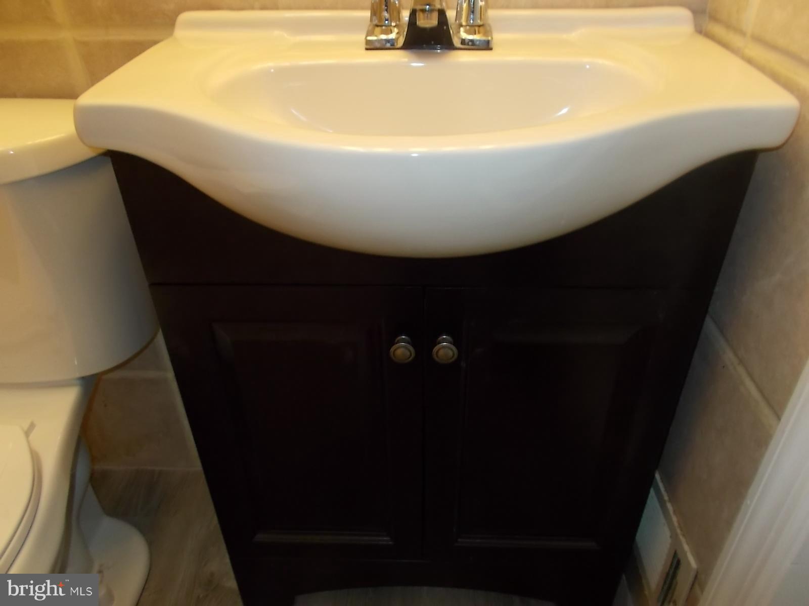 627 Aldworth Road Baltimore, MD 21222 - Photo 8 of 14 Bathroom sink