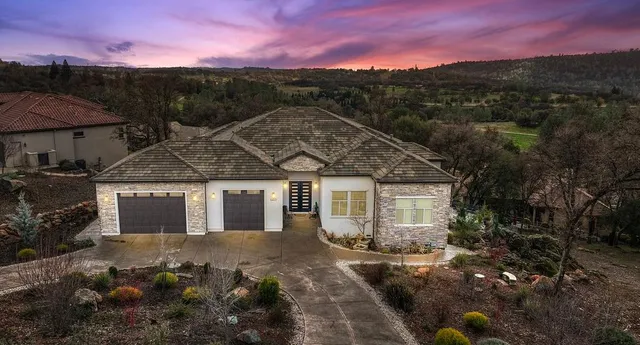 a living room with furniture fireplace and flat screen tv