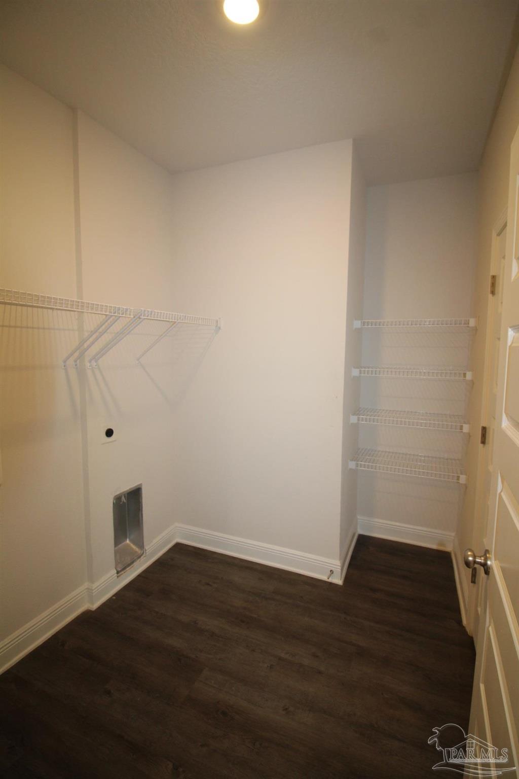 8006 Burnside Loop Pensacola, FL 32526 - Photo 20 of 22 a view of a room with wooden floor