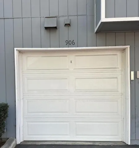 a view of a house with backyard porch and sitting area