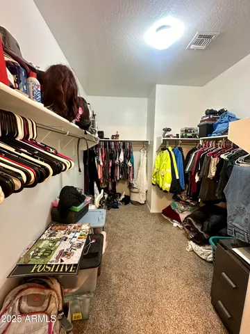 a large bathroom with a double vanity sink a and mirror