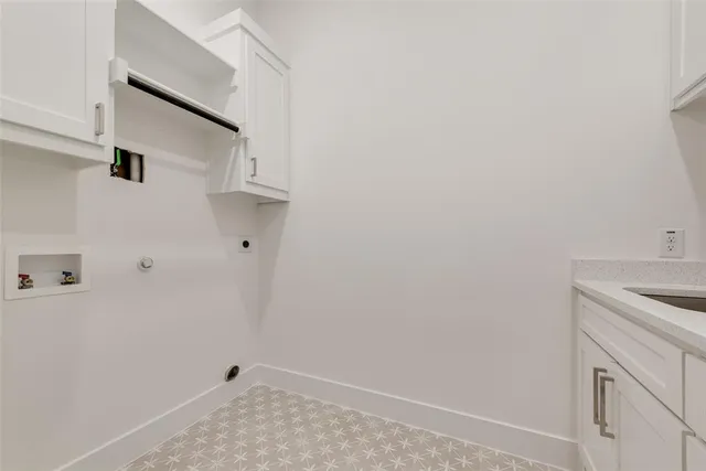 a view of a room with shelf on the wall