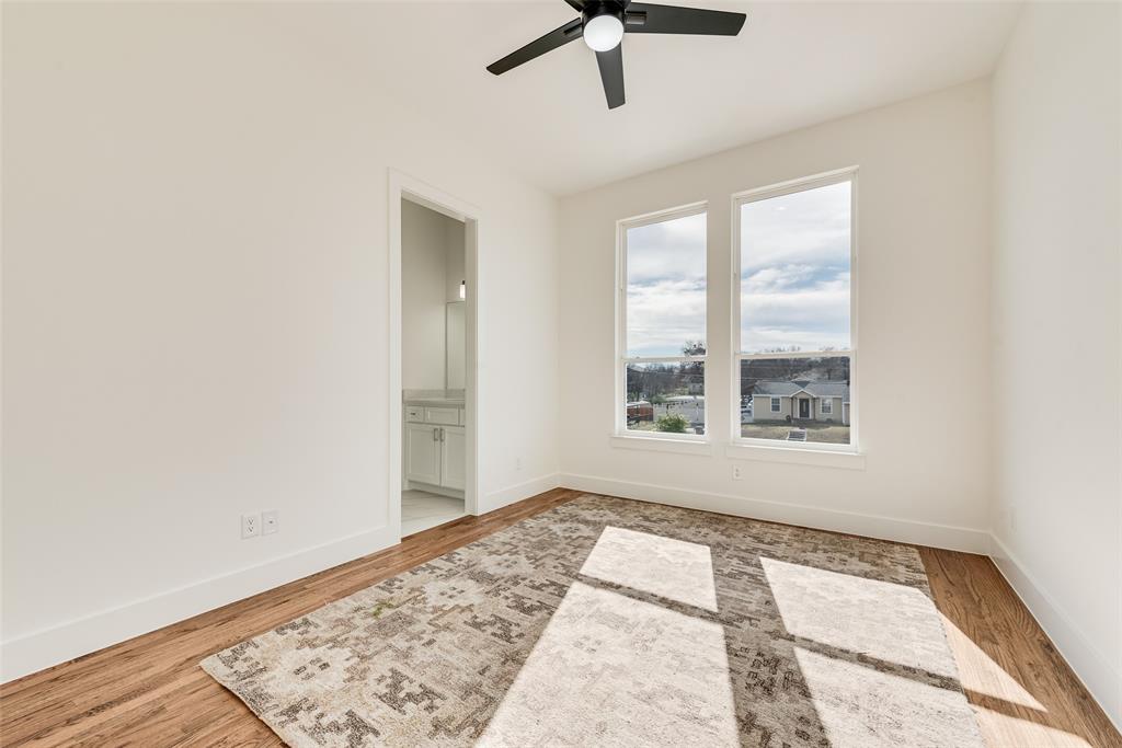 539 West Laureland Road Dallas, TX 75232 - Photo 30 of 37 a view of an empty room with a window
