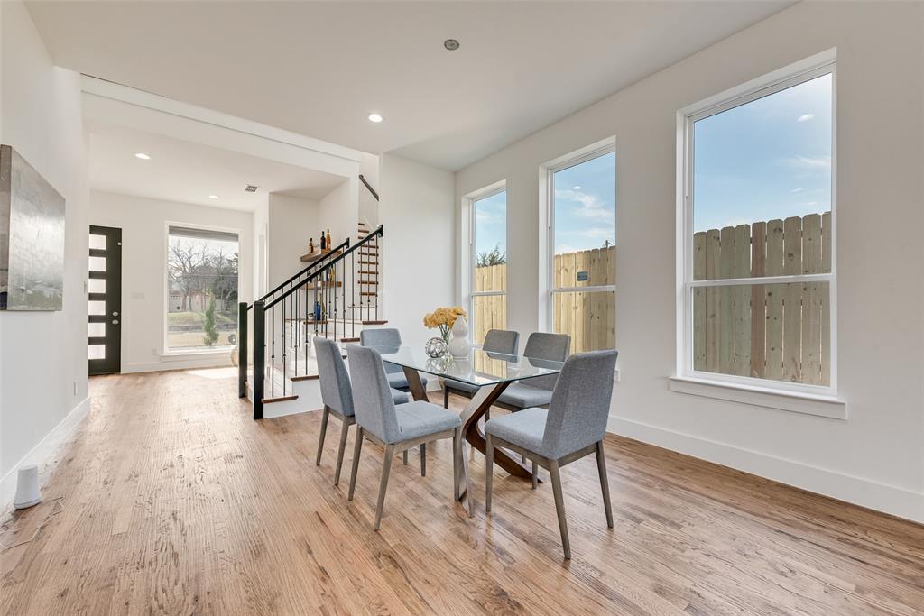 539 West Laureland Road Dallas, TX 75232 - Photo 10 of 37 a dining room with furniture entryway and wooden floor