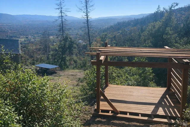 a view of a balcony with an outdoor space
