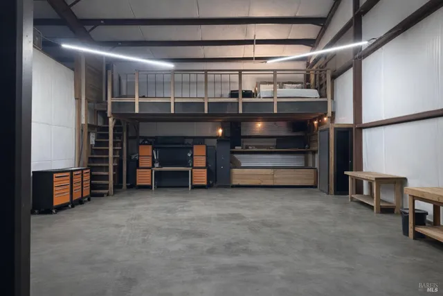 a view of room with furniture and a ceiling fan