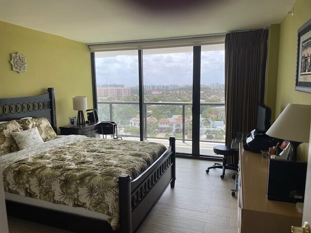 250 South Ocean Boulevard, Unit 11B Boca Raton, FL 33432 - Photo 38 of 47 a bed sitting in a bedroom next to a window