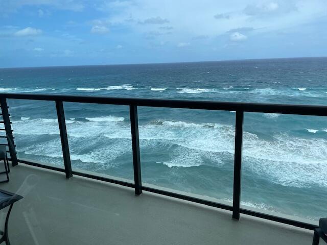 250 South Ocean Boulevard, Unit 11B Boca Raton, FL 33432 - Photo 47 of 47 a view of a floor to ceiling window next to a yard