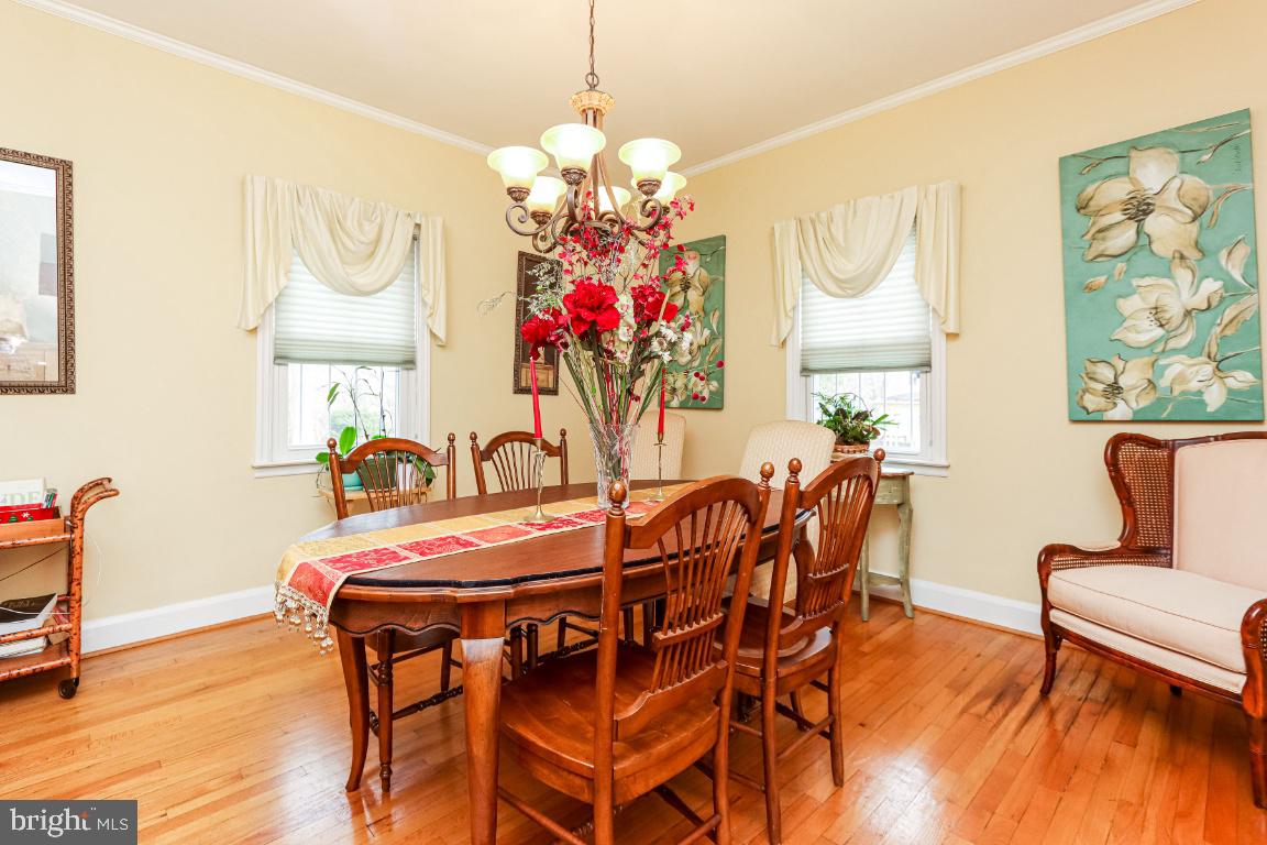 503 North Bend Road Baltimore, MD 21229 - Photo 12 of 47 Formal dining room with hardwood floor