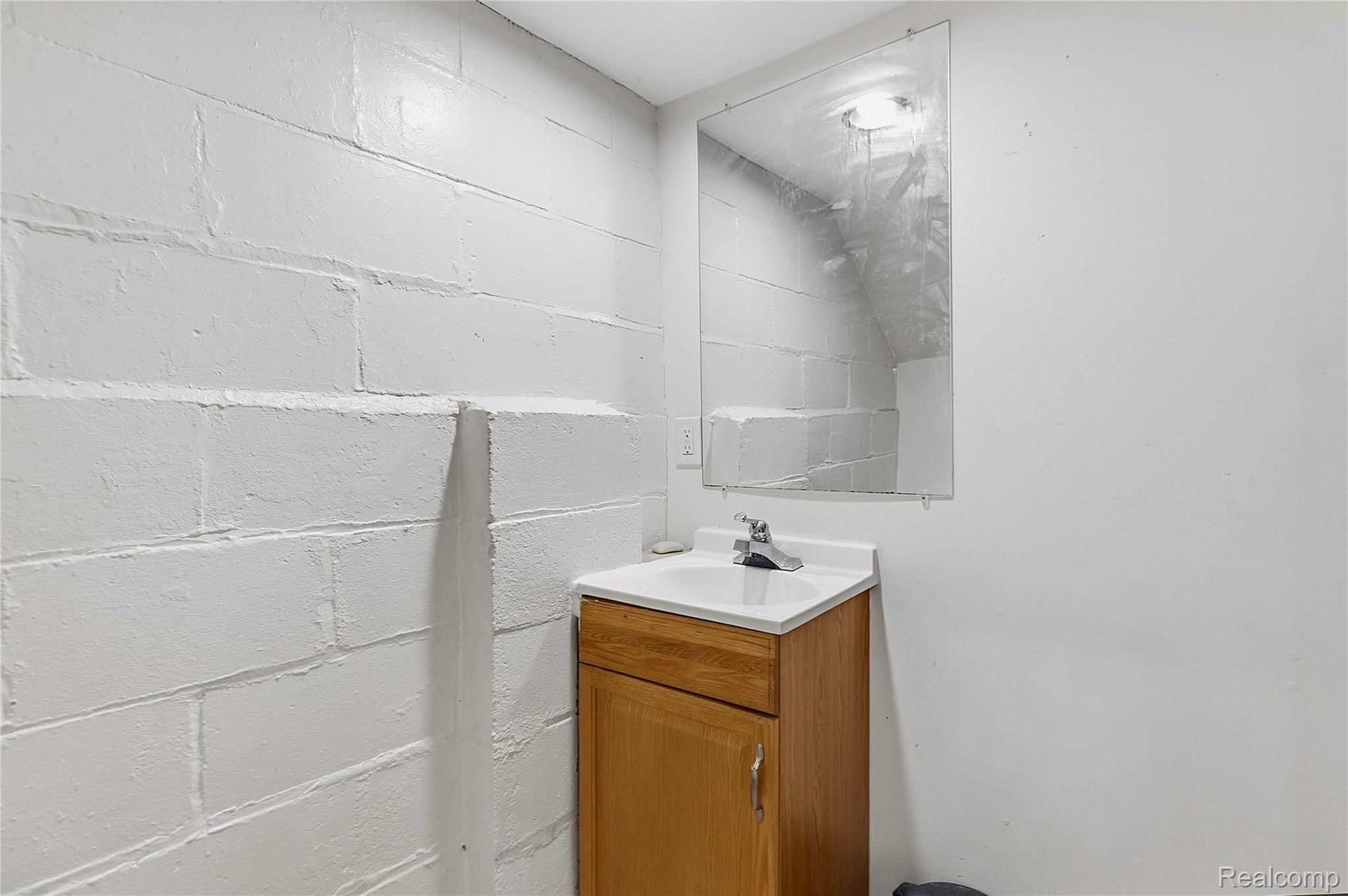 11429 East Eight Mile Road Warren, MI 48089 - Photo 16 of 23 Bathroom with vanity