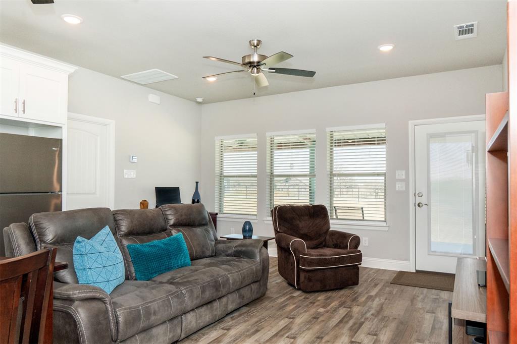 849 County Road 4764 Boyd, TX 76023 - Photo 32 of 40 a living room with furniture and a large window