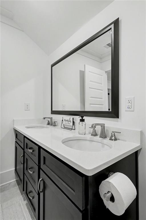 943 Clubside Drive Monroe, GA 30655 - Photo 56 of 93 a bathroom with a sink and a mirror