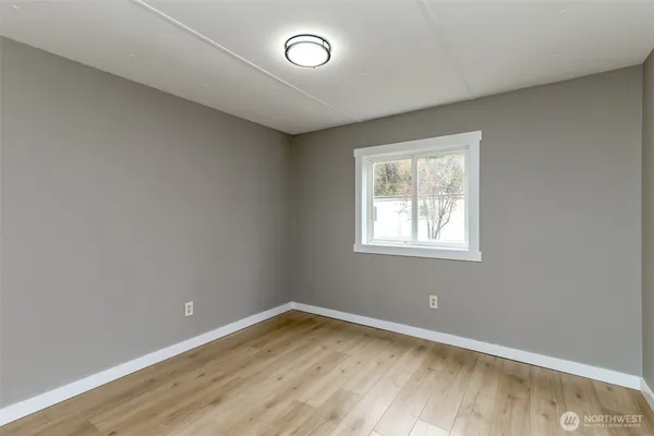 a view of a house with a small yard