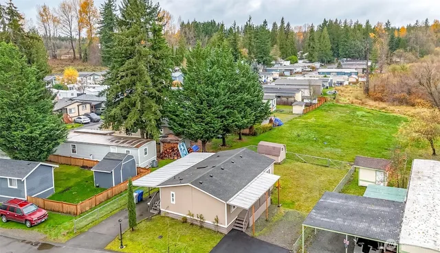 a view of a backyard with a patio