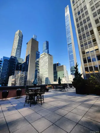 a building outdoor space with patio furniture