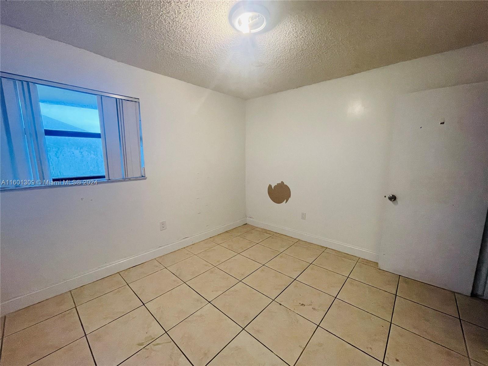 6475 Southwest 129th Place, Unit 4034 Miami, FL 33183 - Photo 15 of 15 a view of an empty room