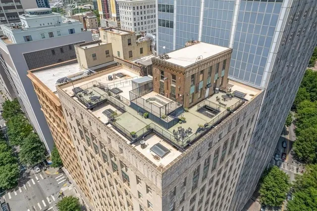 a view of balcony with wooden floor