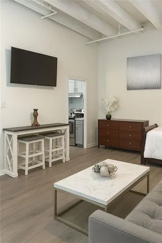 a living room with furniture and a window