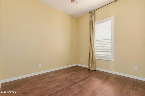 a view of a room with sliding door and a floor to ceiling window