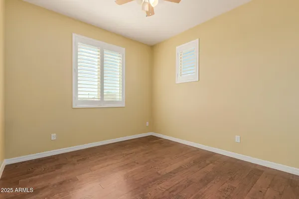 an aerial view of a house with a ocean view