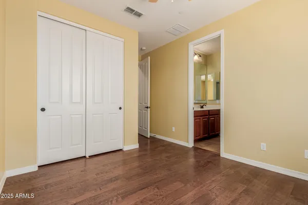 an aerial view of a house with a lake view