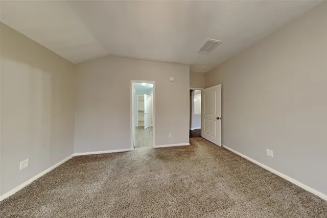an empty room with an entryway