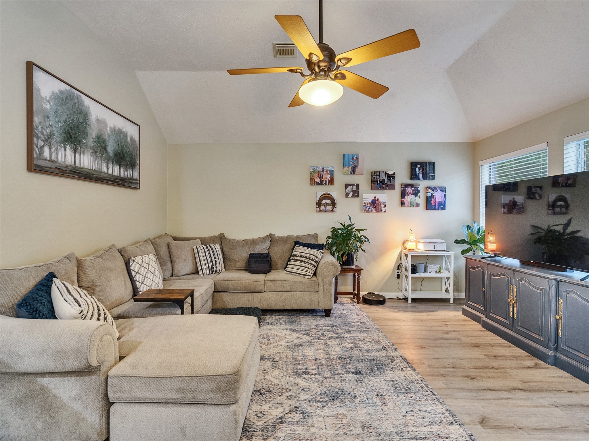8806 Granite Gorge Drive Spring, TX 77379 - Photo 11 of 28 a living room with furniture and kitchen view