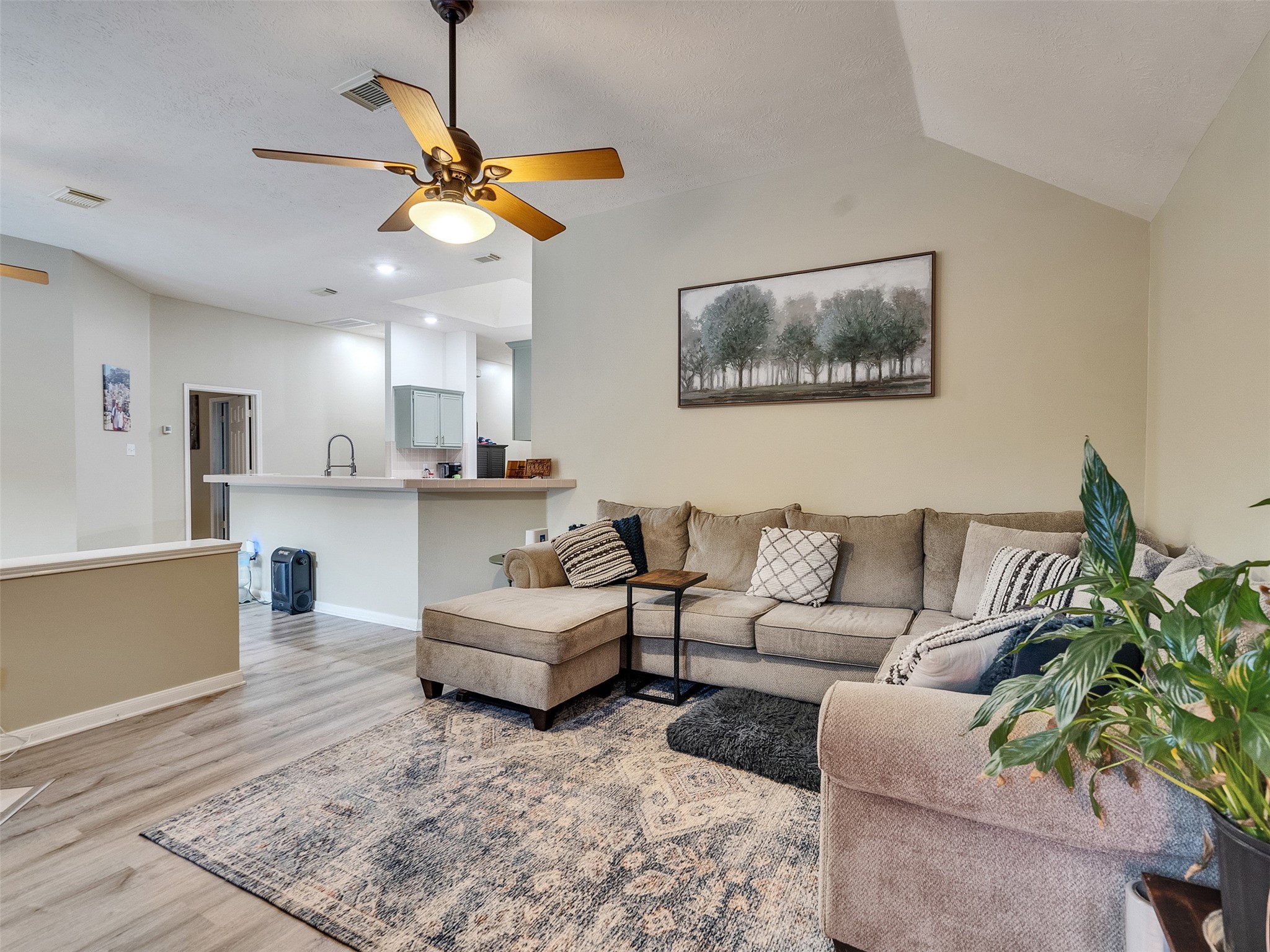 8806 Granite Gorge Drive Spring, TX 77379 - Photo 12 of 28 a living room with furniture and kitchen view