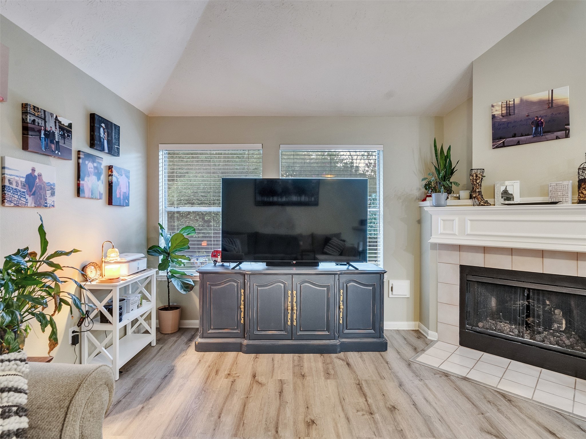 8806 Granite Gorge Drive Spring, TX 77379 - Photo 14 of 28 a living room with furniture and a flat screen tv