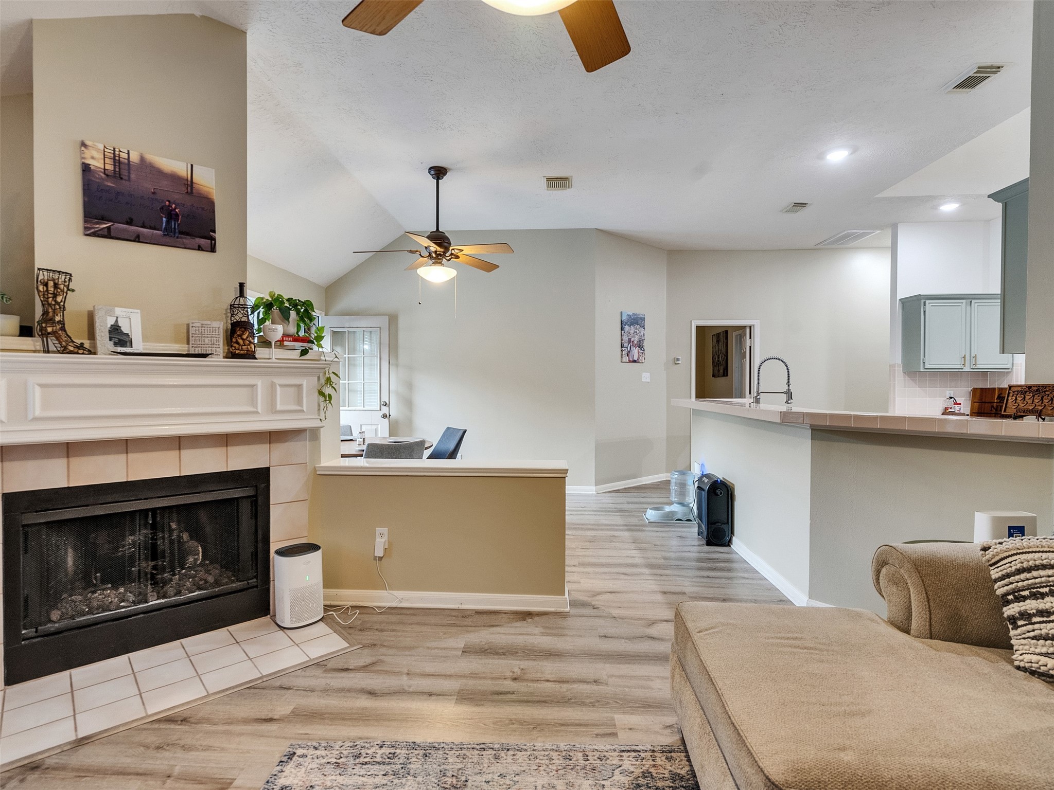 8806 Granite Gorge Drive Spring, TX 77379 - Photo 15 of 28 a living room with furniture and a fireplace