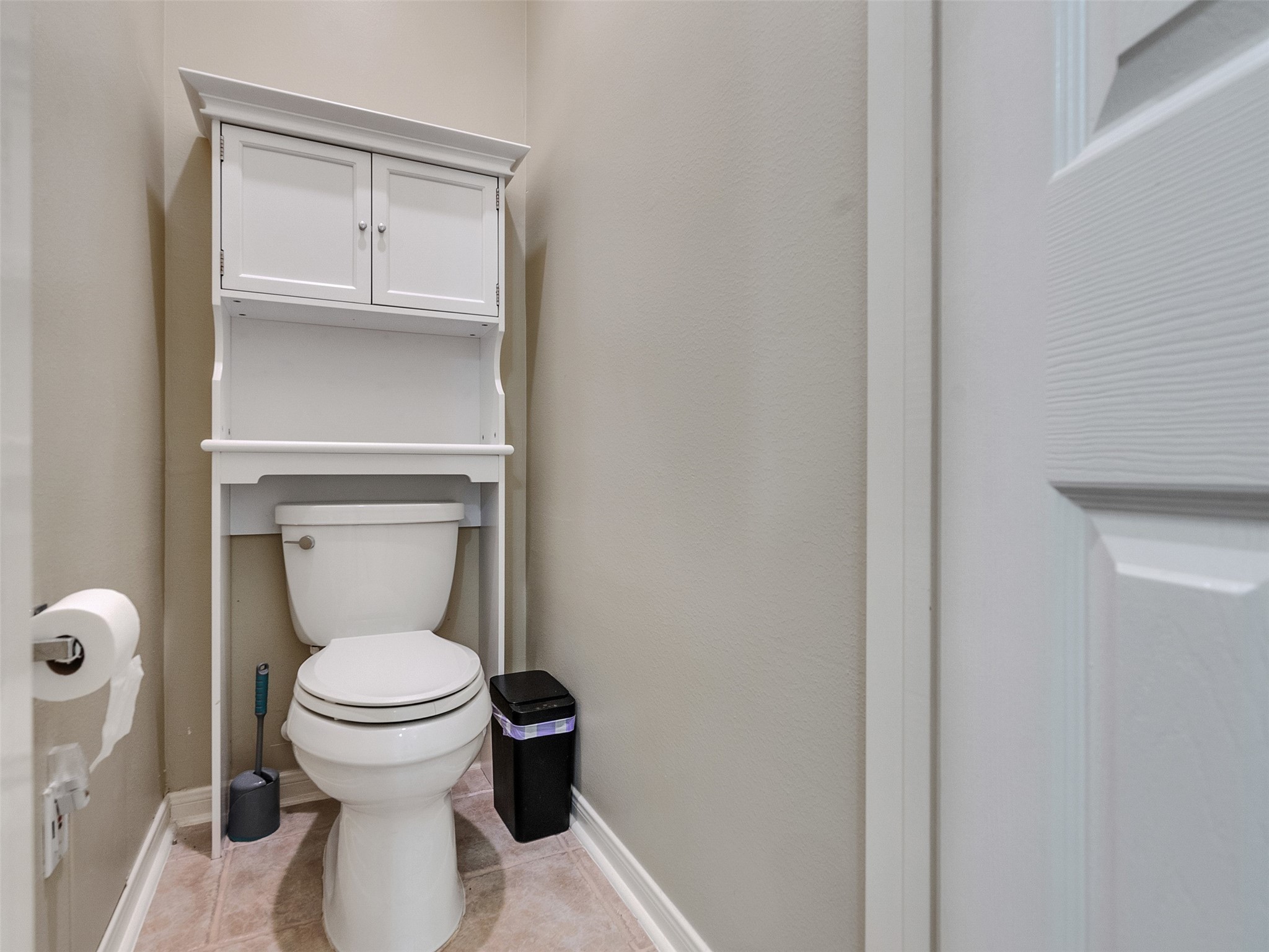 8806 Granite Gorge Drive Spring, TX 77379 - Photo 22 of 28 a bathroom with a toilet and a sink