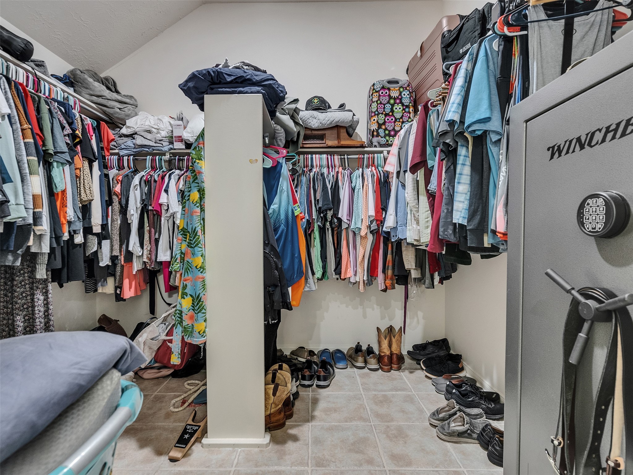8806 Granite Gorge Drive Spring, TX 77379 - Photo 23 of 28 a view of walk in closet with clothes and shoes