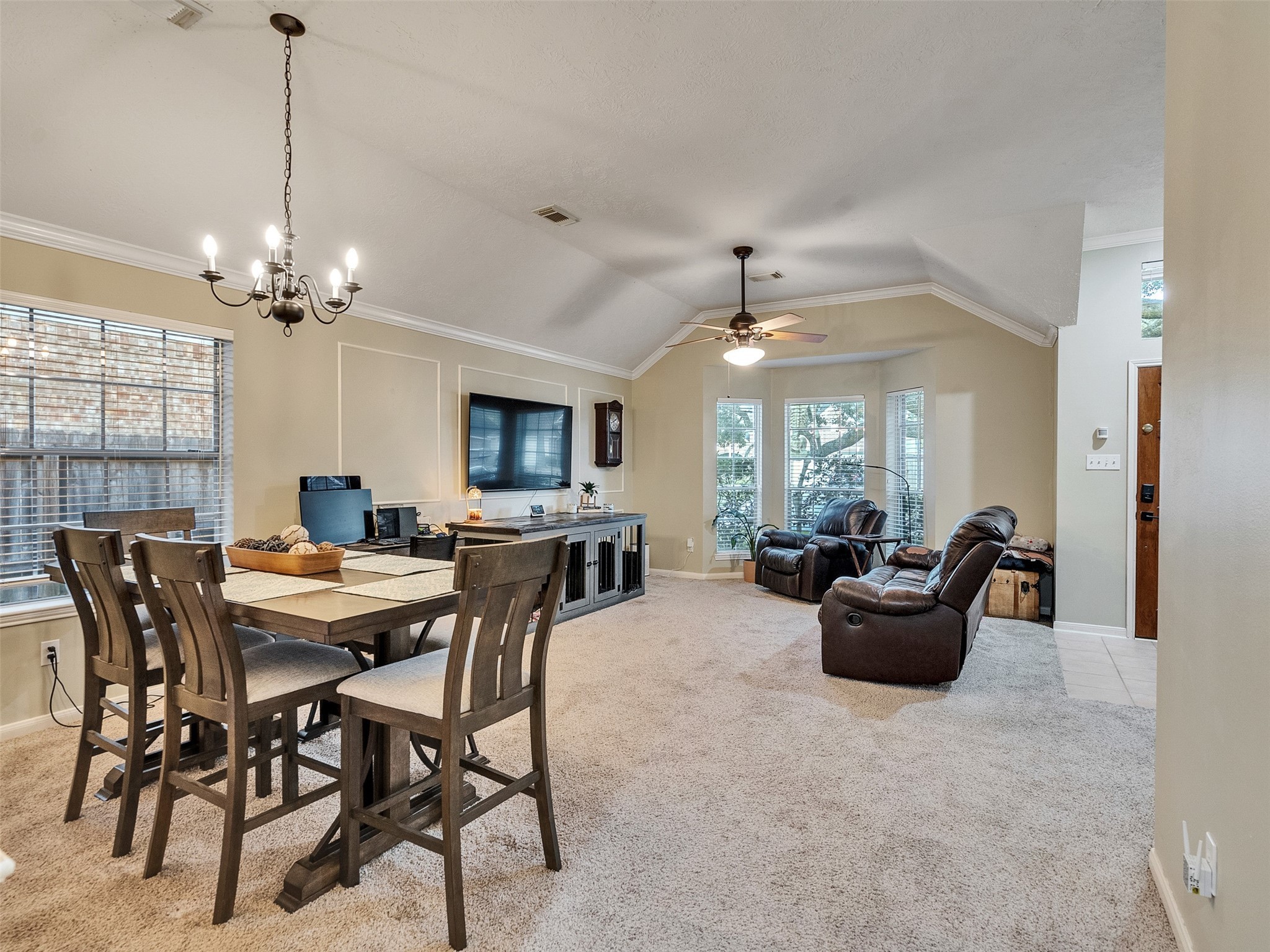 8806 Granite Gorge Drive Spring, TX 77379 - Photo 5 of 28 a view of a dining room with furniture window and wooden floor