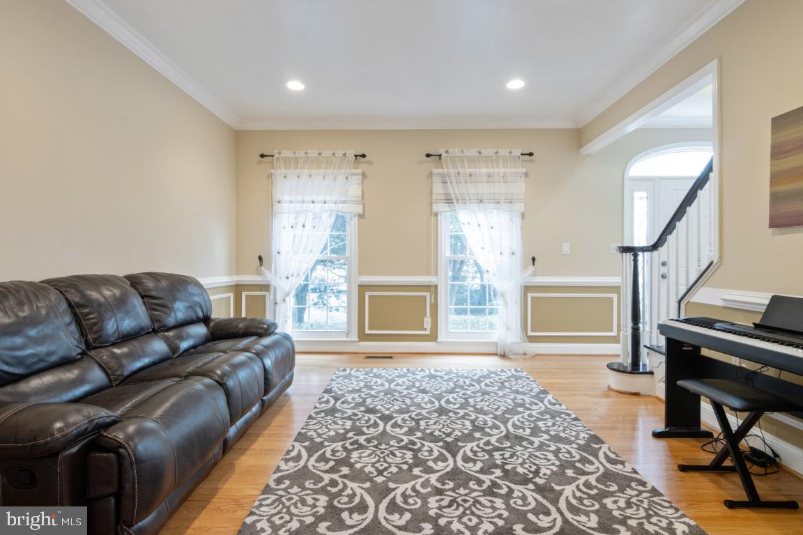 9717 Rugby Court Ellicott City, MD 21042 - Photo 6 of 59 Living room with recessed lights & hardwood floors